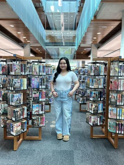 Tracey in the library.