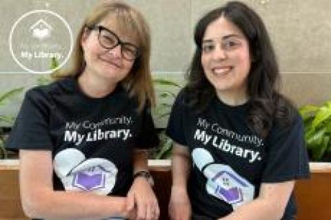 two people sitting on a bench